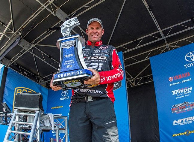 Kevin VanDam Holding Champion's Trophy