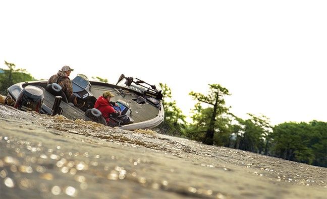 Boat making a hard right turn on the water