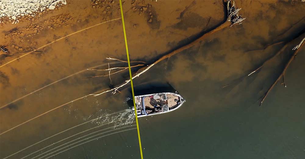 justin atkins surveying in lakemaster boat