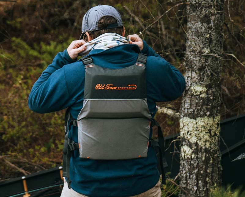 Man wearing Old Town Treble Angler Sportsman Life Jack