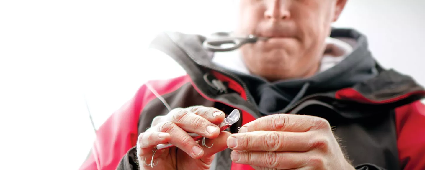 Angler preparing fishing line