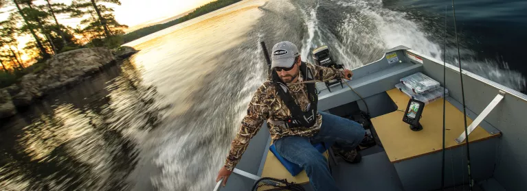 Pmax fish finder mounted on a speeding Jon Boat